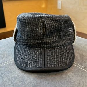 Outdoor Research Yukon Cadet Hat with ear flaps. Size Medium. Checkered grey.